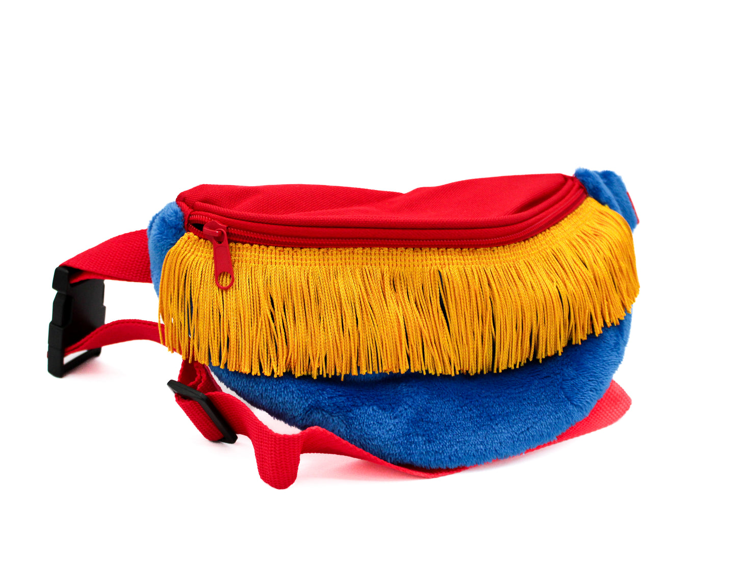 Meet our Fringe Fanny Pack - Yellow, a standout waist accessory with a red zippered top, bold yellow fringe, and soft blue faux fur on the lower half. It includes adjustable red straps and a black buckle for style and functionality on any adventure.