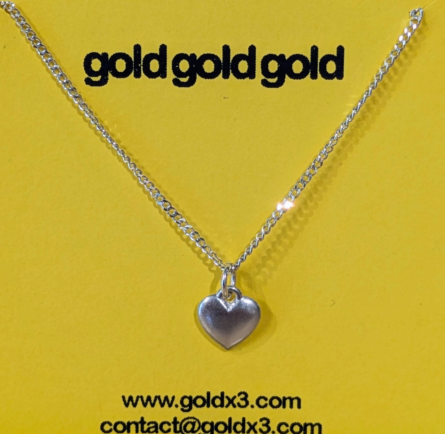 Heart Necklace by goldgoldgold